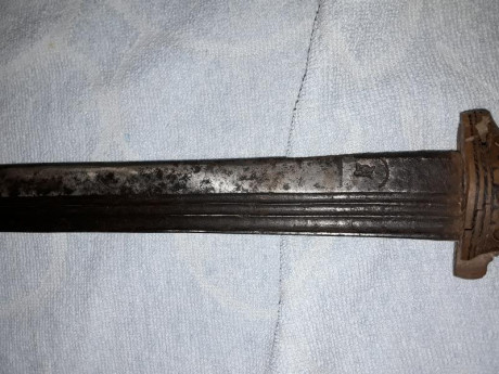 Sable árabe (supongo) antiguo. Tiene diversos marcajes que no se que son, lo cierto es que no es ninguna 00