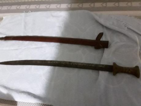Sable árabe (supongo) antiguo. Tiene diversos marcajes que no se que son, lo cierto es que no es ninguna 11
