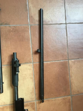Vendo Mossberg combo con dos juegos de cañones, uno rayado para bala y otro liso, culata retractil con 40
