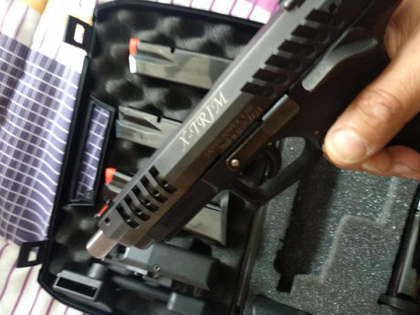 Se vende Grand Power Xtrim en perfecto estado. 4 cargadores, funda para IPSC, tress guardamontes y caja 01