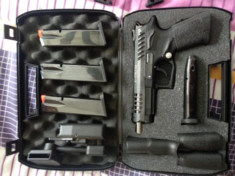 Se vende Grand Power Xtrim en perfecto estado. 4 cargadores, funda para IPSC, tress guardamontes y caja 00