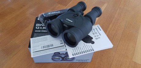 Vendo prismaticos Canon estabilizados de 12x36 III con poquisimo uso y en estado de reestreno con embalaje,estuche 12