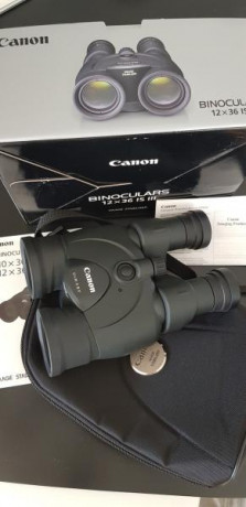 Vendo prismaticos Canon estabilizados de 12x36 III con poquisimo uso y en estado de reestreno con embalaje,estuche 10