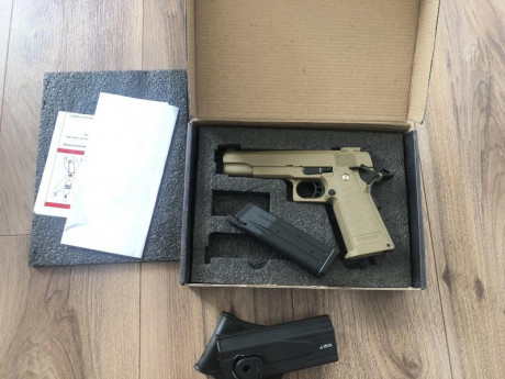 Pongo a la venta mi colt 1911 color arena de golder eagle, es el modelo hi-capa gas, totalmente nueva 02