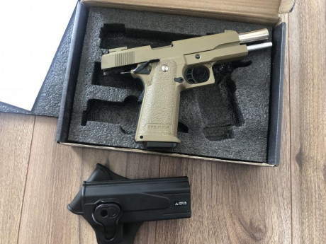Pongo a la venta mi colt 1911 color arena de golder eagle, es el modelo hi-capa gas, totalmente nueva 01