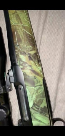 Hola. 
Un compañero me ofrece este rifle, me gustaría que me ayudaseis a saber si se corresponde con un 00