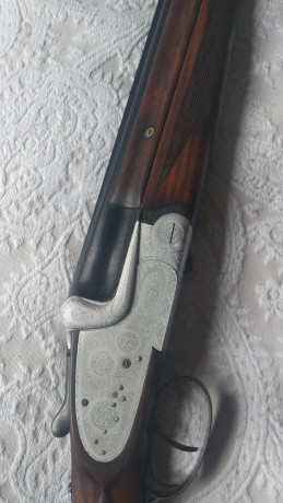 un amigo vende una escopeta superpuesta aya 34 expulsora calibre 12 con 76cms cañones tres y una estrellas 02