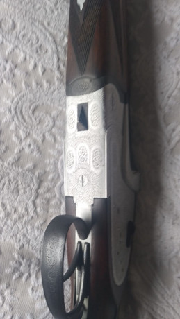 un amigo vende una escopeta superpuesta aya 34 expulsora calibre 12 con 76cms cañones tres y una estrellas 01