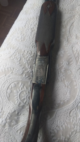 un amigo vende una escopeta paralela victor saraqueta calibre 12.saludos. 02