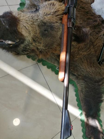 Extraordinario rifle con un cañon de 42 ctms,en un estado de conservación extraordinario, tanto estetica 01