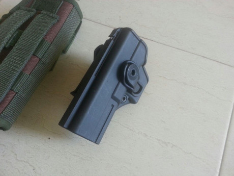 Vendo estas dos fundas para glock 17 de tirador zurdo, una del fabricante Israeli IMI (ORIGINAL) y la 01