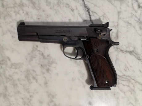 Taurus pt99 9mm Pb.2 cargadores solo tiro 150 tiros.400 euros.Estado nuevo.

Smith Wesson 952-1,5". 02