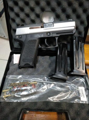 Pistola  9mm. HK USP Compact. Inox- negro.  Kit de limpiez.  Funda de seguridad rígida Safari Land. Perfecto 00