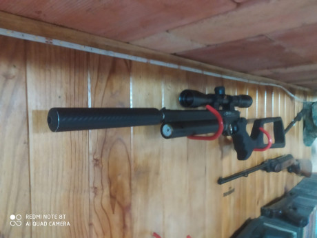 UN AMIGO VENDE pistola onix sport 4,5 con acabado carbono, silenciador, acople para el mismo en aluminio, 02