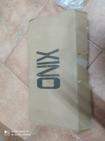 UN AMIGO VENDE pistola onix sport 4,5 con acabado carbono, silenciador, acople para el mismo en aluminio, 01