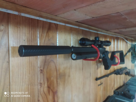 UN AMIGO VENDE pistola onix sport 4,5 con acabado carbono, silenciador, acople para el mismo en aluminio, 00