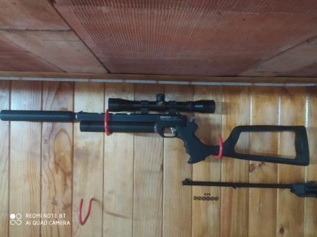 UN AMIGO VENDE pistola onix sport 4,5 con acabado carbono, silenciador, acople para el mismo en aluminio, 11