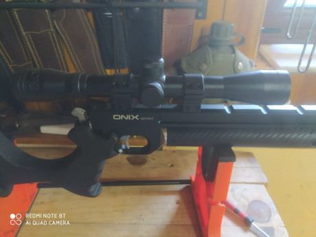 UN AMIGO VENDE pistola onix sport 4,5 con acabado carbono, silenciador, acople para el mismo en aluminio, 10