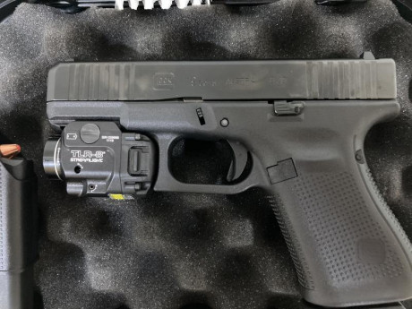 Se vende pistola Glock 19 Gen5 con linterna táctica Streamlight TLR-8 con láser, en calibre 9mm. Se le 00