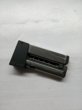  1602420434067451815809.jpg Vendo este cargado  de pistola Benelli de 5 cartuchos, tiene poco uso y lo 00