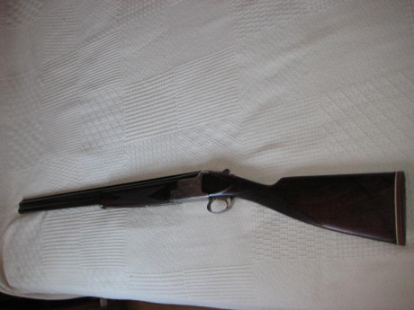 hola se vende superpuesta browning b125 calibre 12 cañones de 71cms de largos tres y una estrellas selector 10