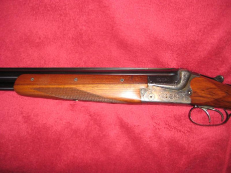 se vende superpuesta merkel 200e calibre 12 cañones de 71cms tres y una estrellas expulsora buen estado..saludos. 11