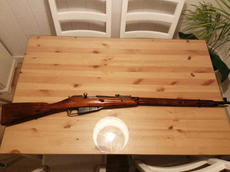 El Mosin-Nagant ..
es un rifle militar accionado por cerrojo, con cargador de cinco proyectiles, que 80