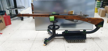 El Mosin-Nagant ..
es un rifle militar accionado por cerrojo, con cargador de cinco proyectiles, que 11