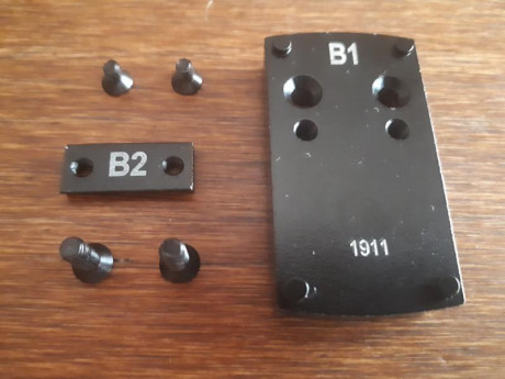 Vendo base con cola de milano para pistola 1911 más plaqueta más tornillos nunca ha sido montado a estrenar 00