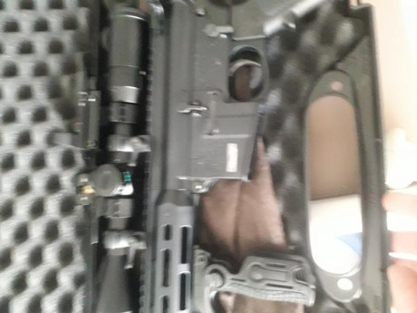 .Carabina s&w mp15 sport 22lr.Con muchos ascesorios.Visor BSA 3-9×40,Lasser,Holografico,Maletín,dos 00