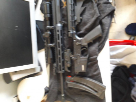 .Carabina s&w mp15 sport 22lr.Con muchos ascesorios.Visor BSA 3-9×40,Lasser,Holografico,Maletín,dos 60