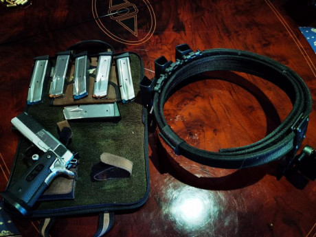 Vendo por cambio de categoría mi SPS plus del calibre 40 S&W  y 9MM (se vende con los 2 cañones, uñas 00