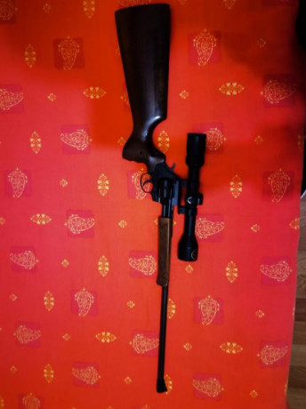 Vendo por no usar CARABINA-REVOLVER ALFA HUNTER CL.22 LR. Se vende con montura y visor .está en perfecto 02