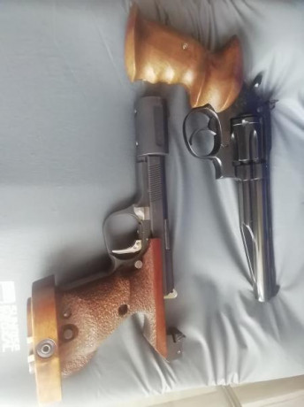 Por no usar se vende lote compuesto por revolver llama olimpico del 38sp/wc y pistola unique des 69 del 01