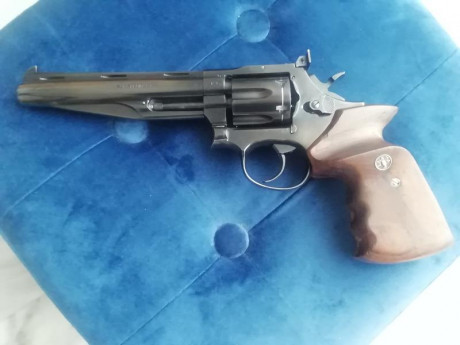 Por no usar se vende lote compuesto por revolver llama olimpico del 38sp/wc y pistola unique des 69 del 42