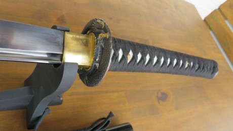 Vendo KATANA inox muy cuidada de Toledo con peana en perfecto estado, el filo es el original no se a utilizado 20