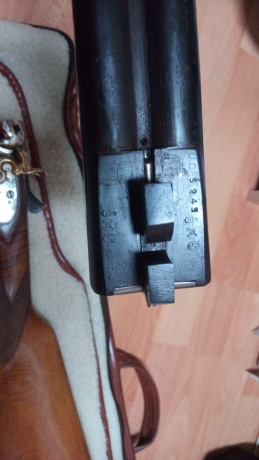 Hola un amigo me pide que le ponga a la venta una escopeta paralela de perrillos esta pavonada y muy bien 01