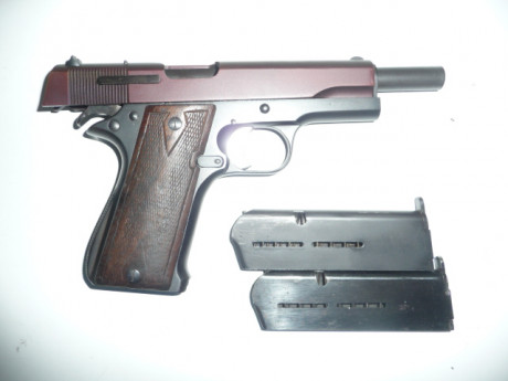 En venta esta pistola, pavonada en marrón, que fue reglamentaria en la Guardia Civil. Estado general muy 01