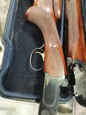 Extraordinaria escopeta ,de la más, que prestigiosa firma de armas Italiana. Resulta una autentica delicia 20