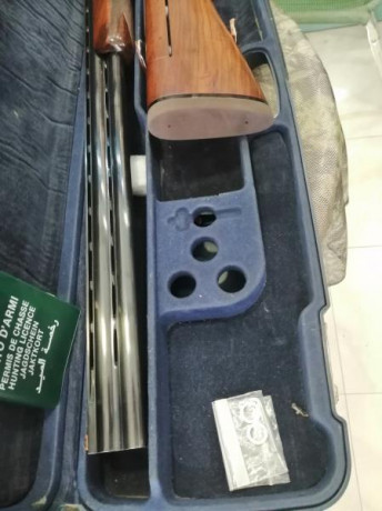 Extraordinaria escopeta ,de la más, que prestigiosa firma de armas Italiana. Resulta una autentica delicia 31