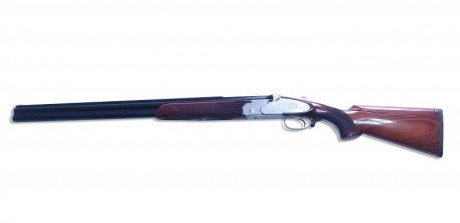 Se vende escopeta Beretta S2 con cañón de 71cm, choques fijos, de 1 y 3 estrellas, con culata de lomo 00