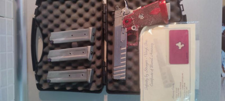 Vendo por no usar Infinity 2011 9mm con muy poco uso..la vendo con 4 cargadores más empuñadura y disparador 02