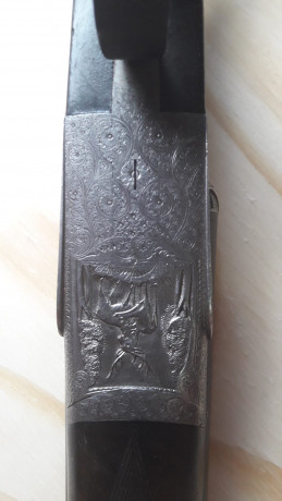 Escopeta del 16 expulsora marca  el faisán, de JM Urriola e hijo.modelo Principe de Asturias ( grabado 11