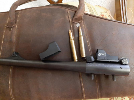 Por falta de uso vendo cañon para Blaser R93 calibre 7x64 con monturas alemanas y pequeño holográfico 00