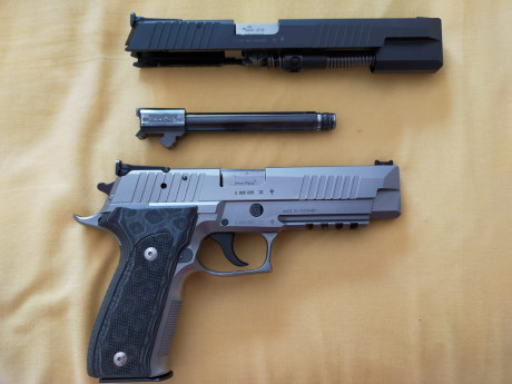 Hola.
Vendo en perfecto estado, Sig Sauer XFIVE 9mm con conversor Sig Sauer XSIX del 22 de 6 pulgadas, 01