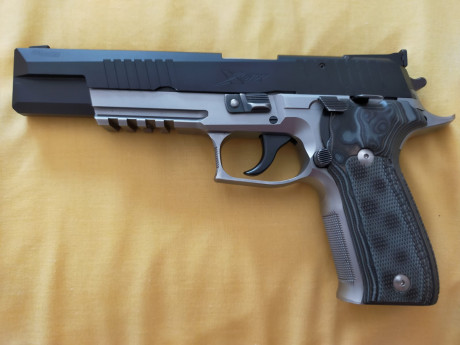 Hola.
Vendo en perfecto estado, Sig Sauer XFIVE 9mm con conversor Sig Sauer XSIX del 22 de 6 pulgadas, 00