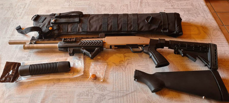 Pongo a la venta mi  Mossberg 500 Mariner (Acabado resistente a la intemperie y corrosión Marinecote® 00