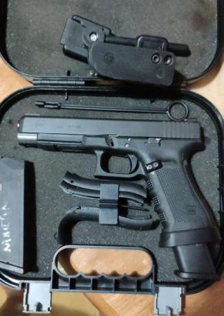 Vendo magnífica Glock 34 4 g.la quito por cambiar a Producción,tiene 2 cargadores funda de extracción 00