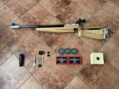 Vendo carabina de aire de competicion,calibre 4,5, revisada en servicio oficial Feinwerkbau donde cambiaron 02