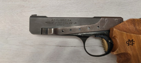 Buenos días

Pongo aquí a la venta una Pistola Olimpic ST-2 22LR , una de las pocas española y fabricada 01